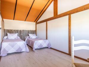 Łóżko lub łóżka w pokoju w obiekcie Holiday Home Rocio by Interhome