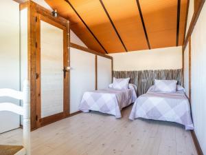 Łóżko lub łóżka w pokoju w obiekcie Holiday Home Rocio by Interhome