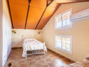 Łóżko lub łóżka w pokoju w obiekcie Holiday Home Rocio by Interhome