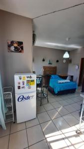 Ένα ή περισσότερα κρεβάτια σε δωμάτιο στο Encantador Apartamento Equipado
