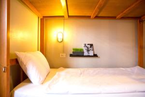 Postel nebo postele na pokoji v ubytování Pak-Up Hostel