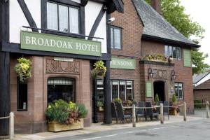 a brick building with a sign that reads broad oak hotel at The Broadoak in Ashton under Lyne