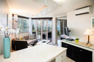 Una cocina o zona de cocina en Sandcastles Mooloolaba