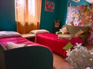 A bed or beds in a room at Odori di zagara