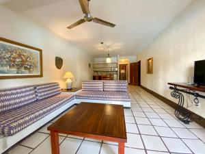 TV a/nebo společenská místnost v ubytování Puerto de Luna Pet Friendly and Family Suites