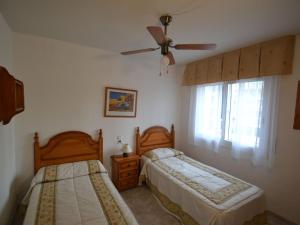 Posteľ alebo postele v izbe v ubytovaní Apartment Village Park 2 by Interhome