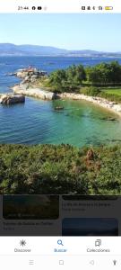 a picture of an island in the water at Casa Loaira Hostal in Isla de Arosa