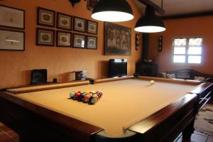 a pool table with balls on top of it at Monte de Portugal in Montargil