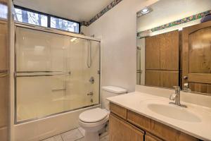 a bathroom with a toilet and a sink and a shower at Homey Colfax Getaway with Private Hot Tub! in Colfax +17 photos