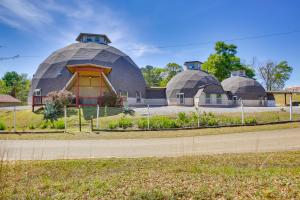 a building with domes on the side of a road at Remote Angie Vacation Rental Near Pearl River! 