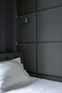 Łóżko lub łóżka w pokoju w obiekcie Rent-Apart City Center Lodz
