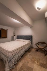 A bed or beds in a room at Zenna - Arco Pronti