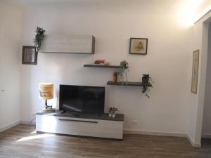 Appartamento Santa Croce TV 또는 엔터테인먼트 센터