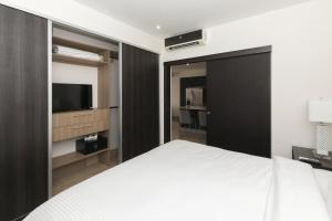 Letto o letti in una camera di Roble Sabana 304 Luxury Apartment - Reserva Conchal