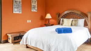 Voodi või voodid majutusasutuse Bougainvillea 5306 Luxury Apartment - Reserva Conchal toas