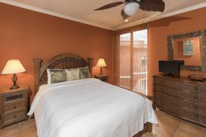 Voodi või voodid majutusasutuse Bougainvillea 5306 Luxury Apartment - Reserva Conchal toas