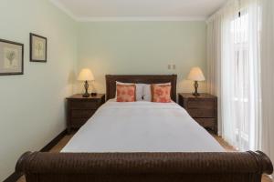 Voodi või voodid majutusasutuse Bougainvillea 5306 Luxury Apartment - Reserva Conchal toas