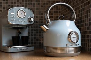 a tea kettle sitting on top of a counter at CASA DI'ELEN in Faliraki
