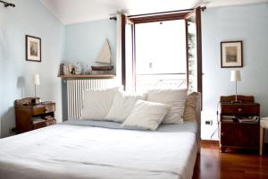 Posteľ alebo postele v izbe v ubytovaní Appartamento Relax Lago di Como
