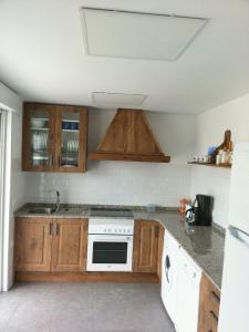 A kitchen or kitchenette at LIOMA VELLA 1 Még 9 kép