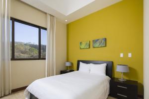 Ένα ή περισσότερα κρεβάτια σε δωμάτιο στο Jobo 7 Luxury Penthouse - Reserva Conchal