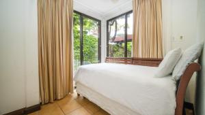 Krevet ili kreveti u jedinici u objektu Bougainvillea 3103 Luxury Apartment - Reserva Conchal