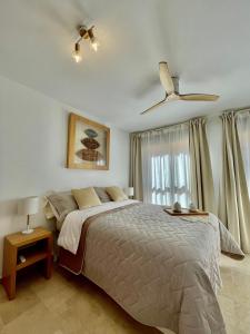 Posteľ alebo postele v izbe v ubytovaní Ivory Suites