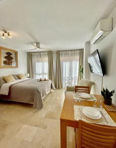 Posteľ alebo postele v izbe v ubytovaní Ivory Suites + 32 fotografií