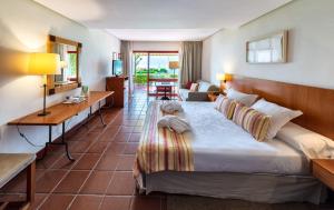 Кровать или кровати в номере Parador de Nerja