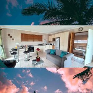 una cocina y una sala de estar con una palmera en SUNSET REST BEACH VILLA en Margate