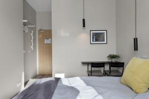 Postel nebo postele na pokoji v ubytování NN Urban Guesthouse