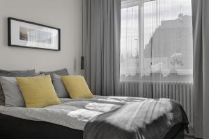 Postel nebo postele na pokoji v ubytování NN Urban Guesthouse