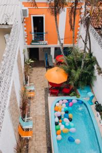 an overhead view of a pool with balls in it at Pousada Bom Sucesso 59 in Olinda