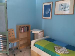 A bed or beds in a room at Vacanze a Finale Ligure