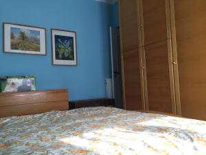 A bed or beds in a room at Vacanze a Finale Ligure