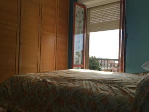 A bed or beds in a room at Vacanze a Finale Ligure