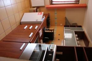 a view of a kitchen with a counter top at City Inn Residence in Timişoara