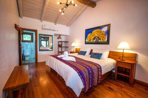 Voodi või voodid majutusasutuse Enchanted Galapagos Lodge toas