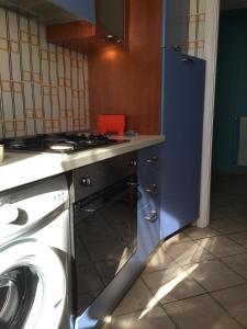 A kitchen or kitchenette at Vacanze a Finale Ligure