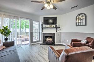 a living room with a couch and a fireplace at Pet-Friendly Bryan Escape about 2 Mi to Texas AandM in Bryan