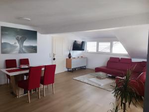 Televízia a/alebo spoločenská miestnosť v ubytovaní Apartma FRIGO