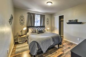 a bedroom with a bed and a window at Family-Friendly Chandler Home Near Downtown! in Chandler