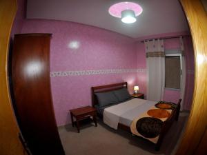 Cama ou camas em um quarto em Coopérative Village Jbel Moussa du Tourisme