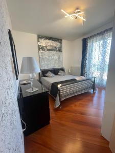 Ένα ή περισσότερα κρεβάτια σε δωμάτιο στο Mareincasa Dimora Luxury