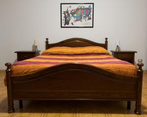 Ein Bett oder Betten in einem Zimmer der Unterkunft Mufasa B&B