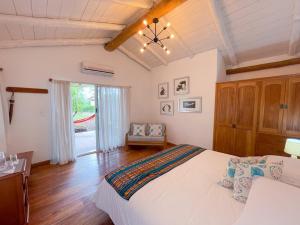Voodi või voodid majutusasutuse Enchanted Galapagos Lodge toas
