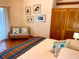 Voodi või voodid majutusasutuse Enchanted Galapagos Lodge toas