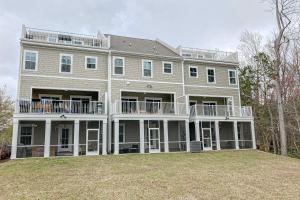 a large house with a large lawn in front of it at A Home Away from Home in North Myrtle Beach