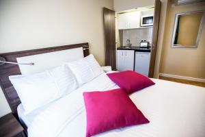Ένα ή περισσότερα κρεβάτια σε δωμάτιο στο Knaresborough Boutique Apartments