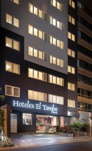 un edificio con un cartel de hotelles el tambo en él en Hotel El Tambo 2, en Lima